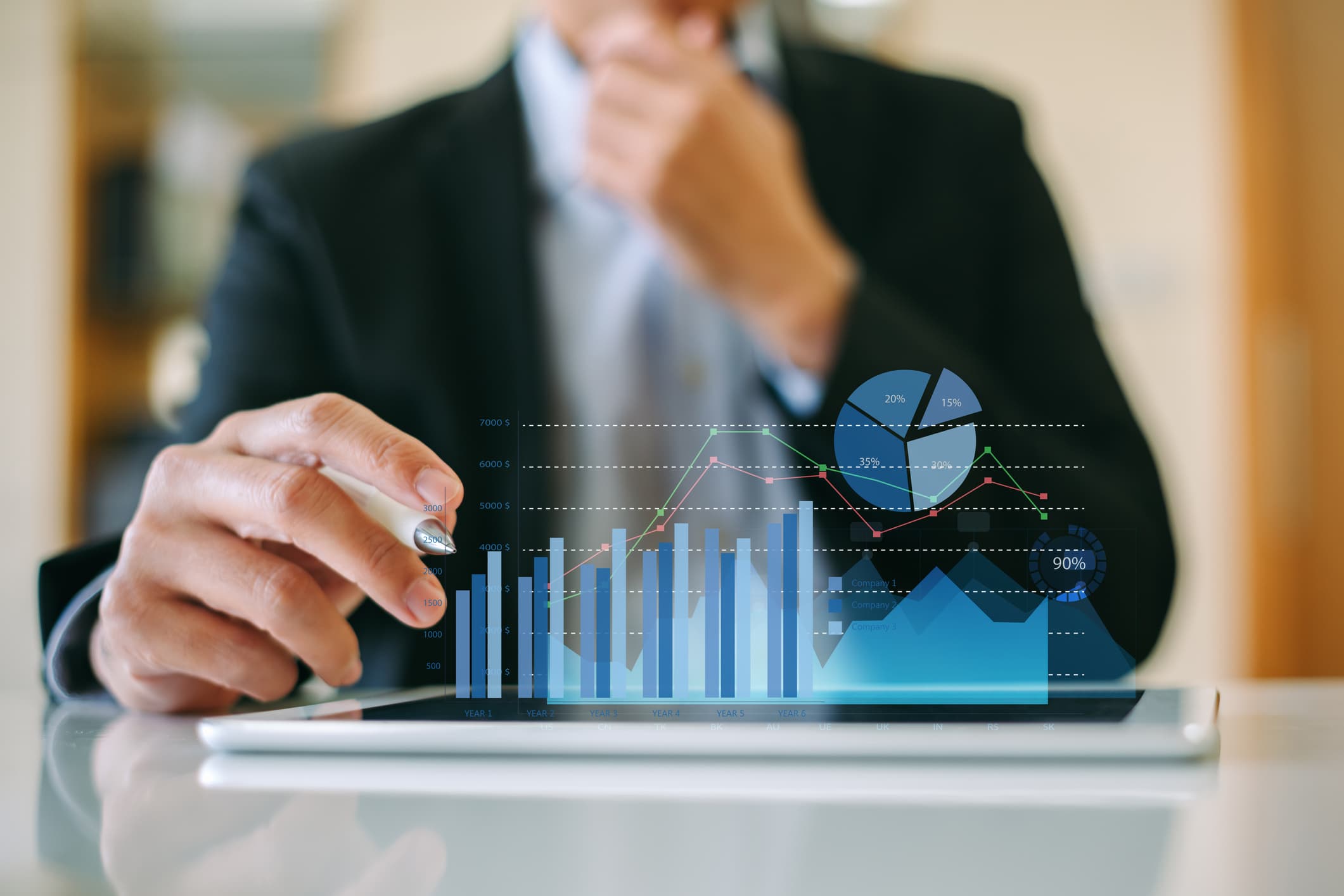 Businessman investor analyzing company financial mutual fund report working with digital augmented reality graphics technology. Concept for business, economy and marketing.