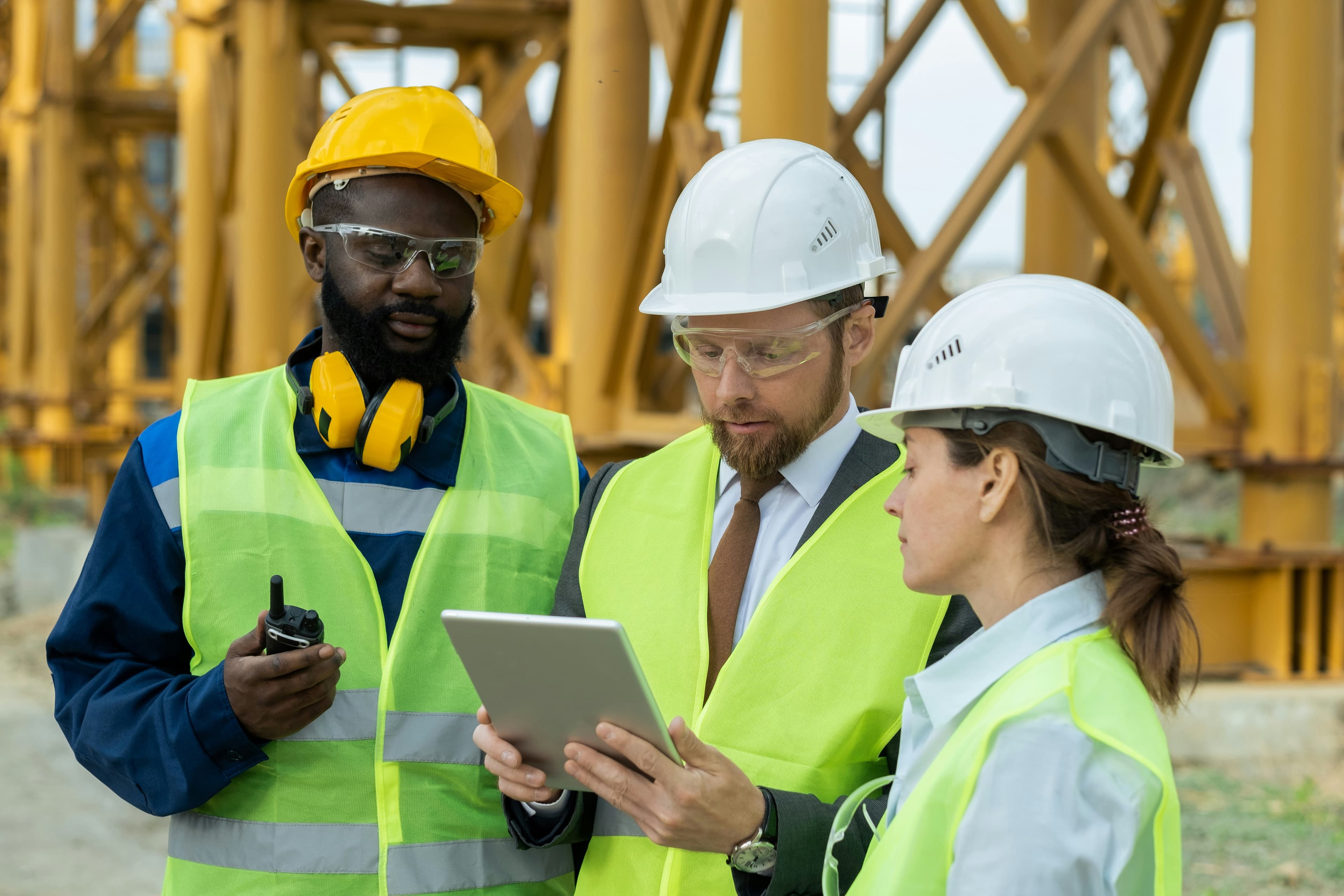 Back office and field workers collaborate on a job site